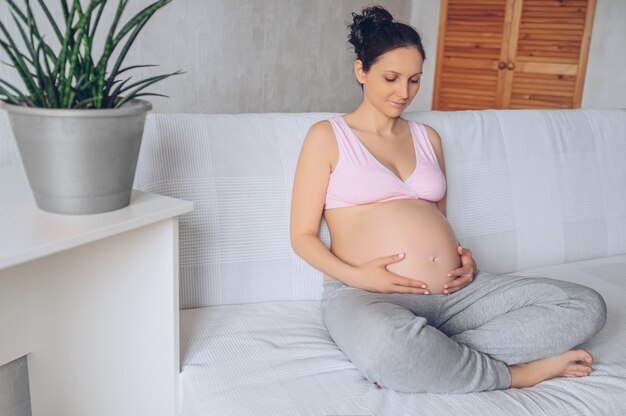 Pregnant girl with huge belly